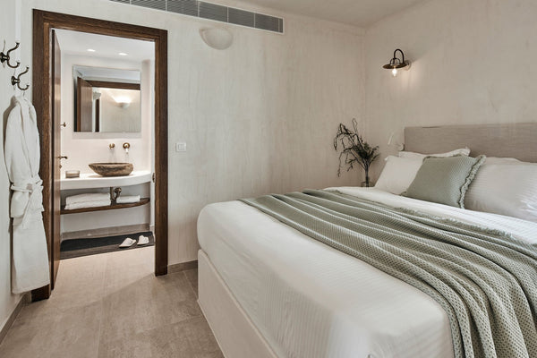 The bright and spacious Family Suite boasts a traditional Cycladic style combine  Winery Hotel 1870-Family Suite Room in hotel vacation rental 44328442
