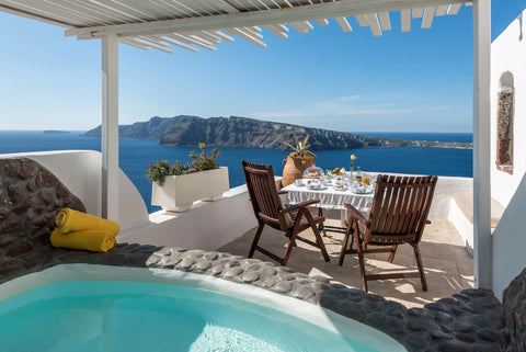 The elegant Fanari Honeymoon Suite in Oia Santorini is traditionally designed an Athens, Greece Fanari Honeymoon Suite Room in hotel vacation rental 583715241075422875