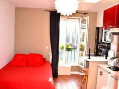 My building is on a very pretty paved yard. Very calms, it is also sunny because Paris, France Canal Studio : cosy and colorfull Entire condo vacation rental 5422479