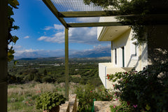 The apartment is located in Kouses village  and it has a bathroom and one room w Pireas, Greece The two locust trees - Kouses apartment with view Entire rental unit vacation rental 27489968