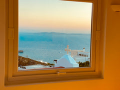 traditional Mykonian house close to light house. <br />Amazing view to Aegean se Mikonos, Greece dominiki's house Barn vacation rental 3289876