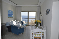 A beautiful recently renovated 2-bedroom flat, located on the seashore, at the v Kalyves, Greece A cozy 2 bedroom flat with stunning sea view Entire rental unit vacation rental 24517419