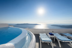 Junior caldera sea & sunset view is located on the TOP of the caldera rim at Ime Imerovigli, Greece Junior caldera sea & sunset view Room in hotel vacation rental 12037217
