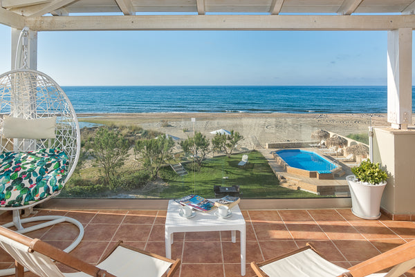 The ''Aptenia'', is the only apartment up to the sand with a grait view of the b Episkopi, Greece Aptenia, beach apartment Entire rental unit vacation rental 17741655