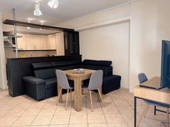 This stylish place is close to must-see destinations.<br /><br /><b>License numb Athens, Greece 2 Bedroom Apartment with private Parking Entire serviced apartment vacation rental 577240907173300020