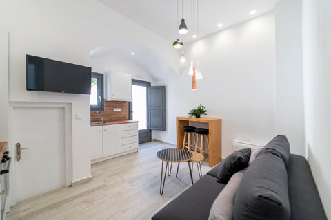 Beautiful and modern flat in the center of Fira, just 5 minutes walk from the fa  Nostos | Nice Apartment with Terrace & Jacuzzi Entire rental unit vacation rental 27391128