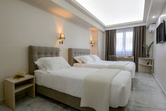 In the heart of Athens, the much beloved and most gorgeous neighborhood of Athen Athens, Greece Triple Room in Athens Starlight Hotel Room in hotel vacation rental 551848877406754090