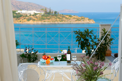 Take a relaxing stroll along the promenade, then dine at your balcony, with the  Agios Nikolaos, Greece Superior Suite with Sea View, Bellevue Suites Entire rental unit vacation rental 19504250