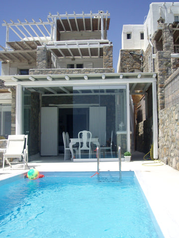 Location: At the exclusive residential area of Ornos<br />•Views: Mykonos’ Town, Mikonos, Greece Big House: 2 appartements & 2 pools & 1 jacuzzi Entire villa vacation rental 583883446418907970