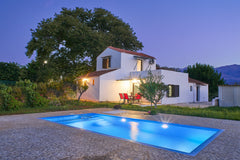 My grandfather’s house from the 1930s, w/the plane tree in front & orange trees   Πλάτανος πέτρινο σπίτι Entire cottage vacation rental 27627403