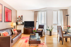 Wake up in the luxurious paneled master bedroom in this quiet, cozy apartment. U Paris, France Luxury Flat in the Heart of the City Entire rental unit vacation rental 8358228
