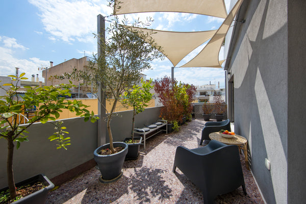 Enjoy the lovely sun and on the balcony with a patio heater! Have breakfast eith GR Brand New Loft walking distance to Acropolis Entire condo vacation rental 557027450844383080
