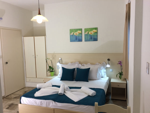 Studio is decorated with soft colors . it has private bathroom, kitchen with all  creta sun studio 27 Entire bed and breakfast vacation rental 18115895