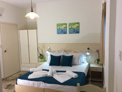 Studio is decorated with soft colors . it has private bathroom, kitchen with all  creta sun studio 27 Entire bed and breakfast vacation rental 18115895
