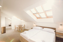 The price includes tourist taxes and is with VAT, breakfast is included in the p  Apartman Deluxe Private room in guest suite vacation rental 34931622