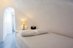 Room with sea view & cliff side view (caldera) are equipped with all comfort ame  Economy Room - Alexander Suites Room in hotel vacation rental 42574385