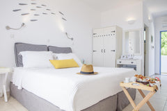 Lindos Sun Hotel blends simple chic with classic Greek traditional style,  combi Fethiye, Turkey Lindos Sun Hotel, Rhodes by LookBookHoliday Room in hotel vacation rental 42053358