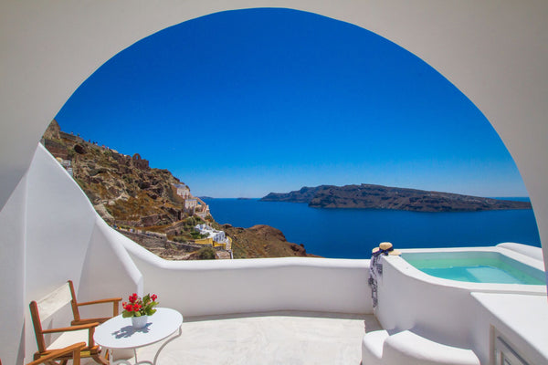 The Honeymoon Suites with Outdoor Hot Tub can accommodate up to 02 persons, feat  Honeymoon Cave Suite with Outdoor Hot Tub Oia Mare Room in boutique hotel vacation rental 54300072