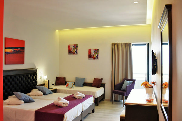 This spacious room can take up to 3 adults, sleeping in an open plan space.  The Heraklion, Greece Deluxe Triple Room - Castello City Hotel Entire rental unit vacation rental 49166734