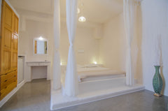 Family room with pristine bathroom.<br />Built with traditional cycladic materia Ios, Greece family room with pristine bathroom Private room in guesthouse vacation rental 21226399