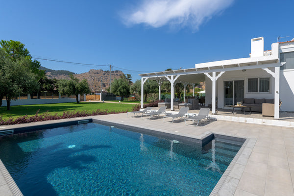 Casa Bianca Villa is an imposing structure located at Kolympia Village. It offer Egeo, Greece Casa Bianca Villa Entire villa vacation rental 35678810