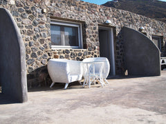 Distances:<br />From Fira: 6 km.  -From the center of Imerovigli: 3 km.<br />Fro  Small villa by the sea 6 km away from Oia village Entire guest suite vacation rental 50346896