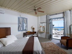 Elegant  Luxury Accommodation with a sitting area inside a  spacious bedroom ,pr  Superior Suite by Porto Kea Entire rental unit vacation rental 9603731