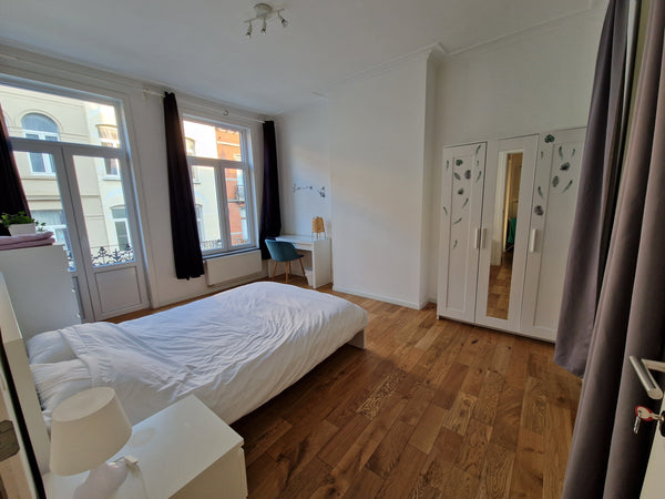 A private double bedroom in a big, bright and clean shared apartement. The apart  Bedroom ☀️ with a balcony Private room in rental unit vacation rental 54253944