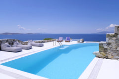 This villa, located in Mykonos, is ideal for 8 vacationers. It offers 4 bedrooms  4 bedrooms villa with sea view, private pool and enclosed garden at Mykonos - 2 km away from the beach Entire home vacation rental 577331872812381703