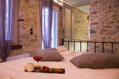 The classic beauty is part of a fully renovated old traditional house in the hea Palaio Faliro, Greece Private Stone House In Ermoupolis Entire rental unit vacation rental 29359506