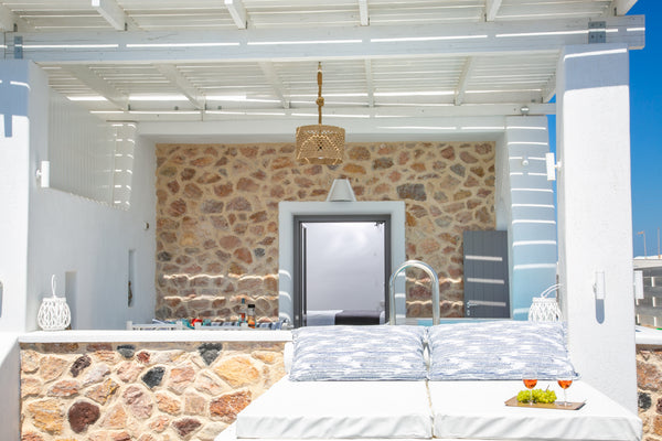 Our Premier Suite opens into a lavish sanctuary where you can unwind and enjoy y  Aegean Melody Suites-Premier Suite,Outdoor Jacuzzi Room in aparthotel vacation rental 41632125