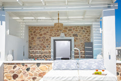 Our Premier Suite opens into a lavish sanctuary where you can unwind and enjoy y  Aegean Melody Suites-Premier Suite,Outdoor Jacuzzi Room in aparthotel vacation rental 41632125