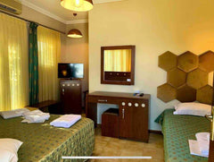 Hotel Semiramis is a hospitable, family-run hotel in a quiet neighborhood of Ada Adamantas, Greece Semiramis Guesthouse  Triple Room Central & Cozy Private room in bed and breakfast vacation rental 21898107
