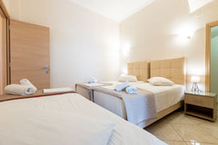 Private room in guest house in the old town, 40m. from seafront and central beac  Triple Room at Lomvardou Hostel Private room in hostel vacation rental 7399821