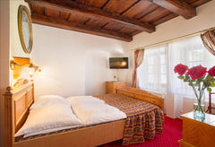 Luxury room for four with 2 bedrooms in a historical hotel Waldstein<br /><br />  Deluxe 2-bedroom Quadruple in hotel WALDSTEIN Room in boutique hotel vacation rental 28168863
