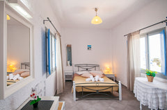 a standard double room with volcano sea view and private bathroom. No balcony in Greece STANDARD DBL ROOM VOLCANO VIEW Room in bed and breakfast vacation rental 11746084