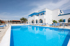 Our room is located in a quiet neighborhood, yet only a few minutes walk from Fi Greece Private room with a pool and balcony with view Room in bed and breakfast vacation rental 24624632