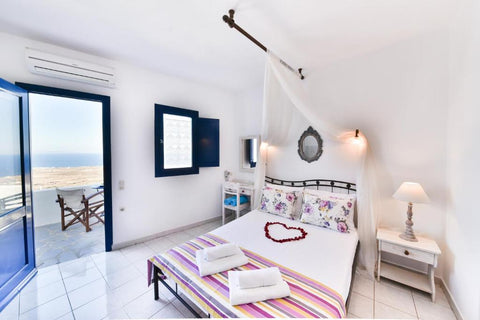 Agnadi Villas Santorini is a brilliantly whitewashed building surrounded by beau  Agnadi Standard Sea View Room Private room in bed and breakfast vacation rental 47465757