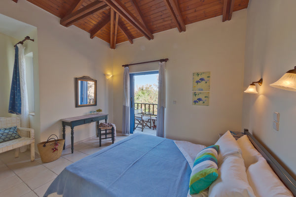 The sitting area with the fully equipped kitchenette and one or two sofa beds ar Chania, Greece Revekka Two Floor apartment Entire rental unit vacation rental 51099419