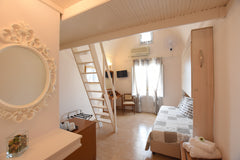 Rodakas Hotel, has 23 rooms with a total capacity of 64 people. <br />We served  Thera, Greece Family Quadruple Room, With Loft, Sea View... Room in bed and breakfast vacation rental 6724115