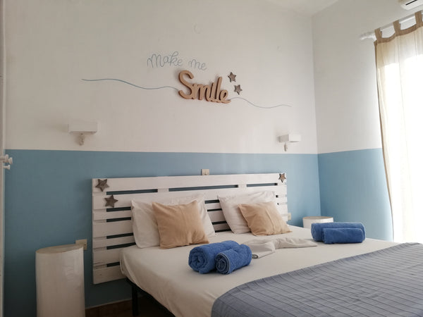 At 700 meters from the port and 100 meters from the beautiful beach of Livadia,  Paros, Greece Angelina Studios Large double room Entire rental unit vacation rental 13703195