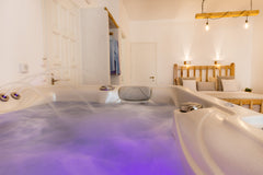 Suite with indoor jacuzzi-hot tub, decorated in a unique cycladic style and situ Naxos, Greece Aqua Suite, Hot-jet tub, 50m to Prokopios Beach Entire serviced apartment vacation rental 44547465