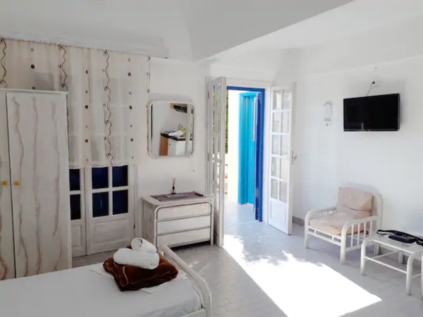 We are in the heart of Perissa , just 300m away from the black sandy beach and 1 Thera, Greece Traditional Studio With private balcony Entire rental unit vacation rental 614960242560861272