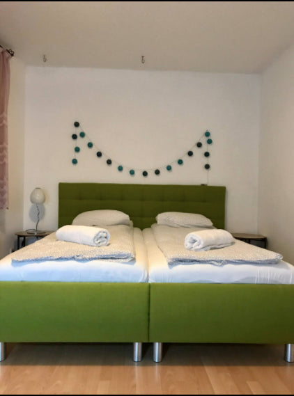 Our flat has 2 bedrooms, 1 bedroom is around 25m2 has a kind size bad, 2 small a  Big cosy flat with balcony, close to city centre. Entire rental unit vacation rental 46510690