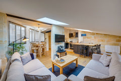 This atypical and cosy apartment is located on the 3rd floor of an 18th century  Rennes, France Le Mansardé - Bail Mobilité calme en plein centre Entire rental unit vacation rental 728693519634378064