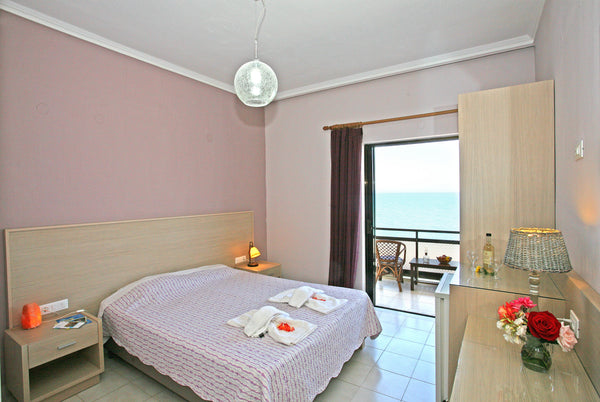Family-run Akrogiali features a beachfront restaurant with a strong foundation o Chania, Greece Beachfront Cretan Sea-Double Room in hotel vacation rental 2865376