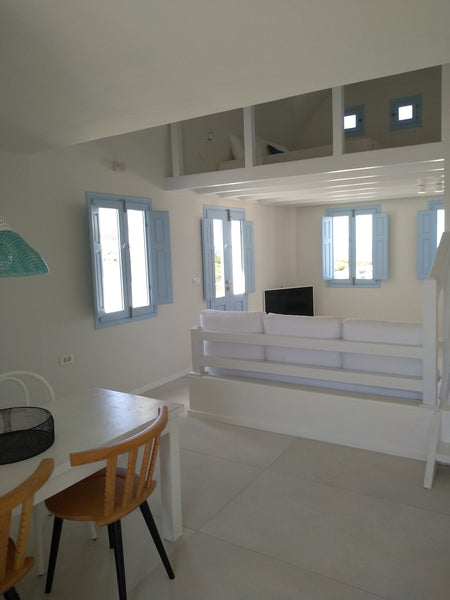 Cycladic-style House with outdoor seating area  and balcony for private use with  Loft-Style Sea & Sunset View Jacuzzi House Dome vacation rental 35550891