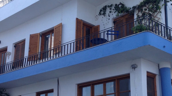 House is set on three floors: Front level entrance to kitchen , leading to sitti  Old store. Main Rd Milatos village Entire home vacation rental 23320253