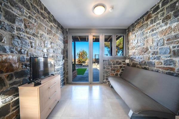 Beachfront stone house in Milatos beach providing garden views and free WiFi. Te Heraklion, Greece TerraZeus - Stone house Beachfront 2 Entire rental unit vacation rental 602770559923262750