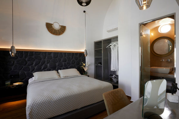Features balcony overlooking the volcano, the sunset, the caldera and the Aegean  Premier Suite with Outdoor Heated Private Jacuzzi Room in hotel vacation rental 39737499